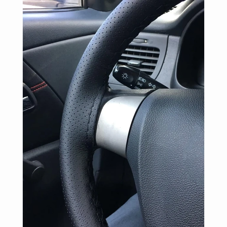 Premium perforated leren stuurhoes, sportief design