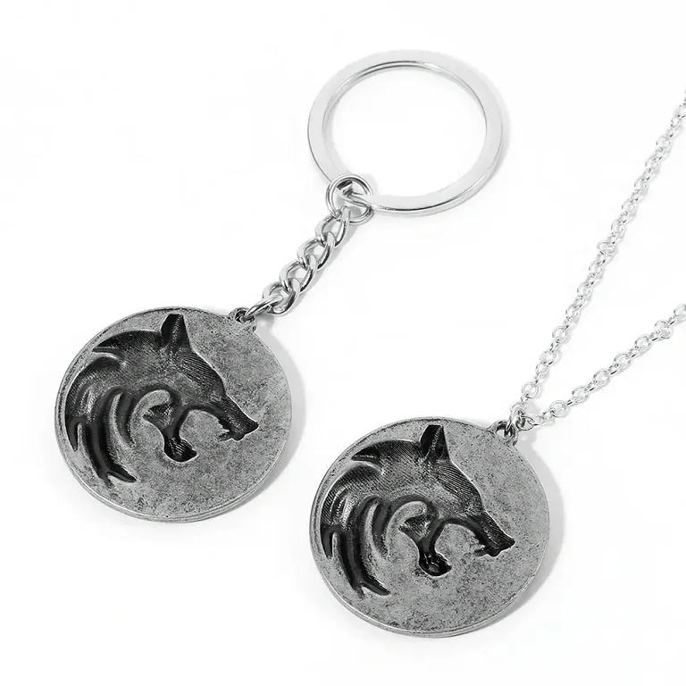 Zilverkleurige medaillons met Wolf-symbolen uit The Witcher – ketting + sleutelhanger