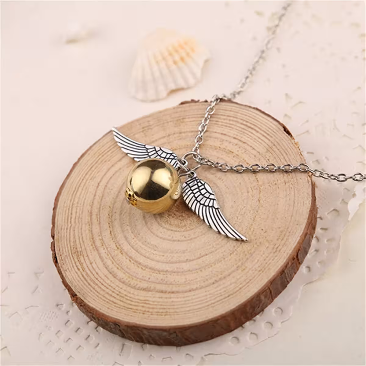 Gouden Snitch hanger met engelenvleugels – Harry Potter stijl